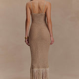 Woman wearing beige metallic knit midi dress with keyhole neckline and fringe hem — Meshki | Endless UAE