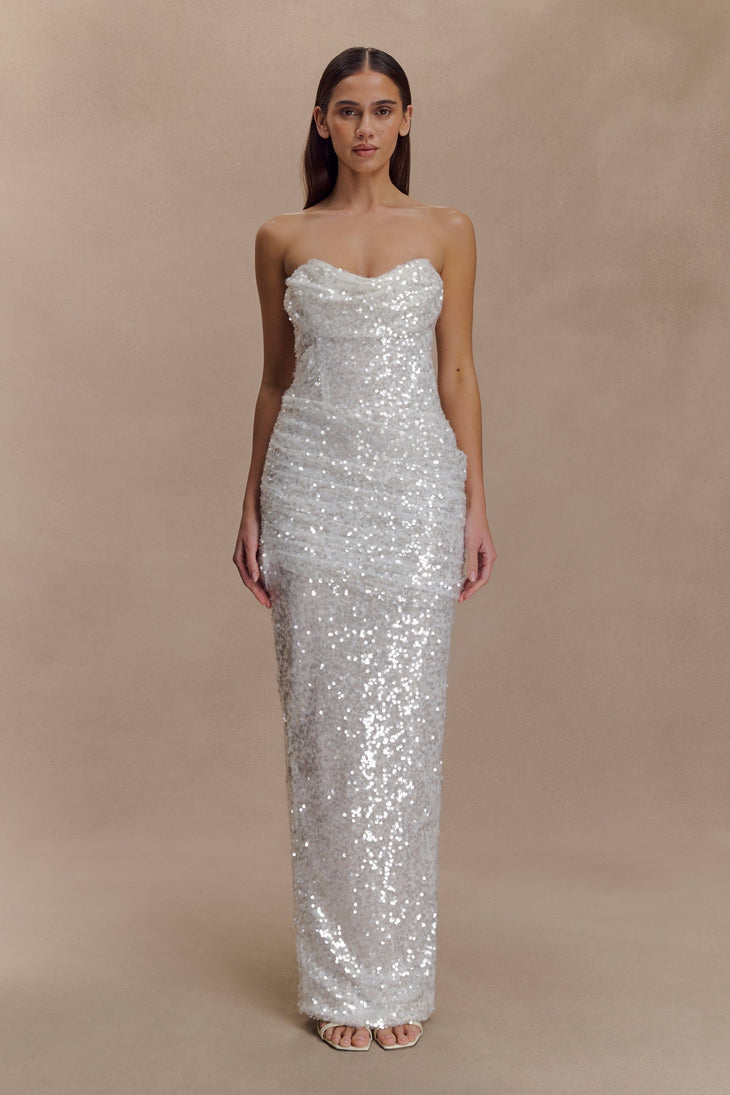 Stunning floor-length strapless gown covered in shimmering white sequins, featuring a fitted silhouette and sweetheart neckline — Meshki | Endless UAE