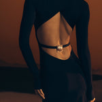 Black long sleeve maxi dress with open back cutout and gold square buckle detail — Meshki | Endless UAE