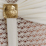 Cream crochet two-piece set with cutout details and gold buckle accents — Meshki | Endless UAE