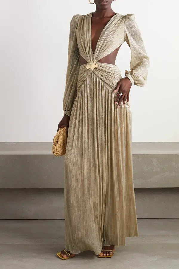 Gold pleated cutout maxi dress with twisted knot detail and long sleeves on model with woven clutch — Patbo | Endless UAE