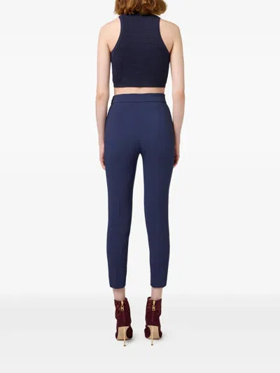 Rear view of navy crop top paired with blue tailored pants — Elisabetta Franchi | Endless UAE
