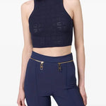 Navy jacquard sleeveless turtleneck crop top paired with high-waisted trousers — Elisabetta Franchi | Endless UAE