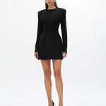Black long-sleeved mini dress with structured shoulders and fitted silhouette, styled with black heels — Rachel Gilbert | Endless UAE