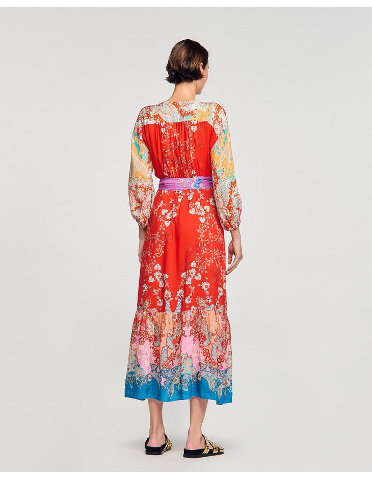 Colorful floral print maxi dress with mixed patterns, long sleeves, pink waist sash, and multi-color hemline detail — Sandro | Endless UAE
