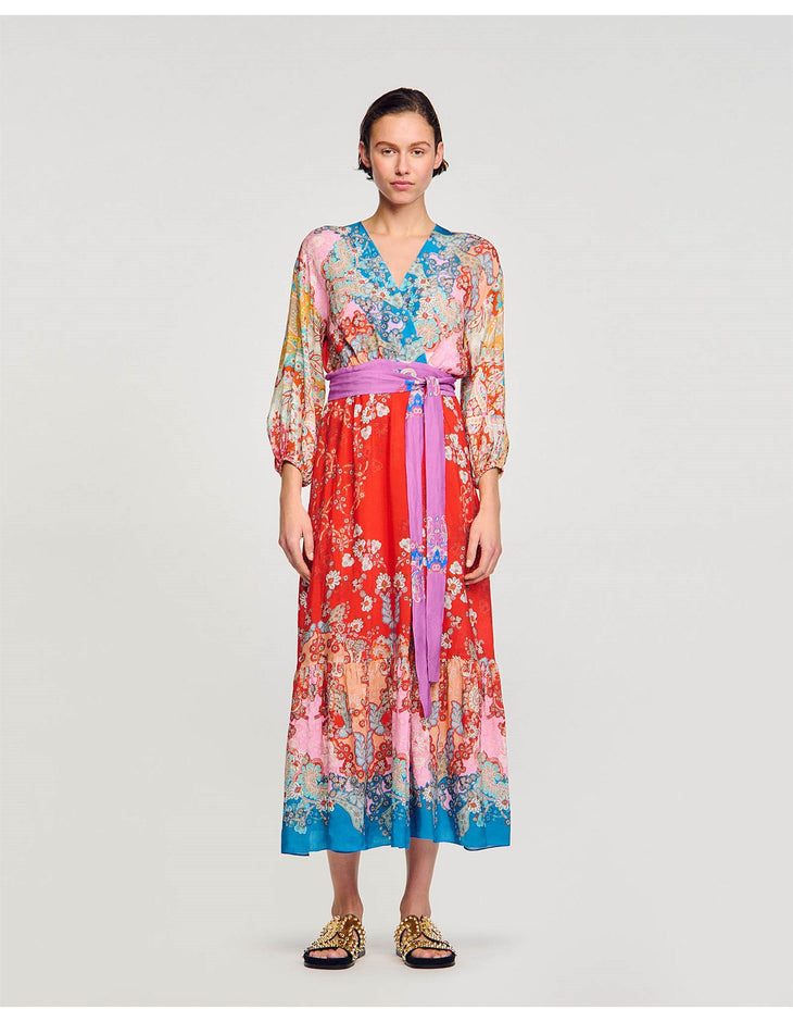 Colorful floral print maxi dress with V-neck, long sleeves, and pink tie waist belt in vibrant multi-color pattern — Sandro | Endless UAE