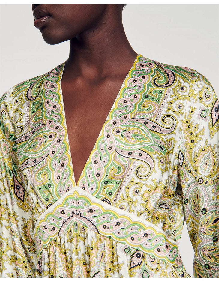 Jayane Woven Dress with green and yellow paisley print and V-neckline on model — Sandro | Endless UAE