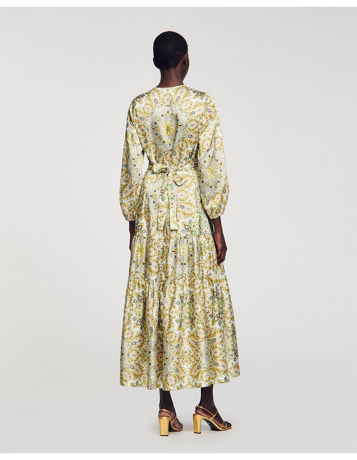 Long sleeve paisley print maxi dress with tiered skirt and belt detail, shown from back — Sandro | Endless UAE