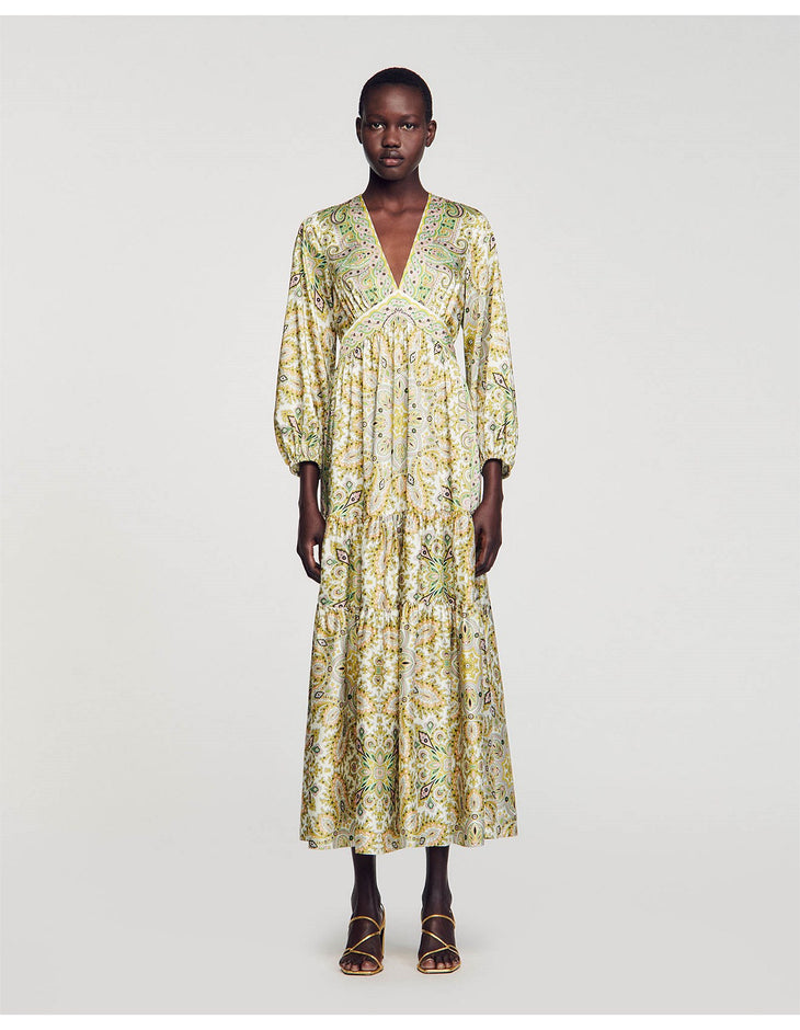 Floral printed maxi dress with long sleeves, V-neckline, empire waist, and tiered skirt in yellow and green tones — Sandro | Endless UAE