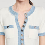 Cream ribbed knit dress with contrast blue denim-style trim and gold button detailing at front and chest pockets — Sandro | Endless UAE