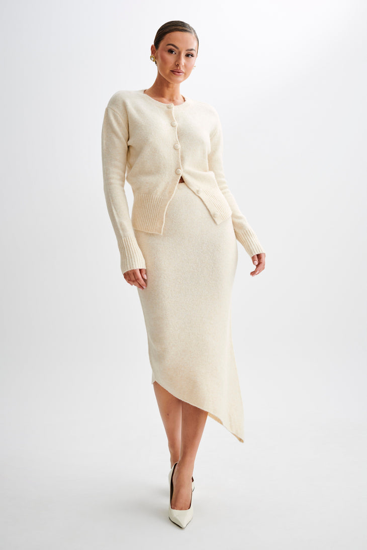 Cream knit co-ord set with button-front cardigan and asymmetric midi skirt — Meshki | Endless UAE