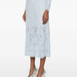 Light blue lace flared midi skirt with frayed hem detail, paired with silver metallic heels — Self-Portrait | Endless UAE