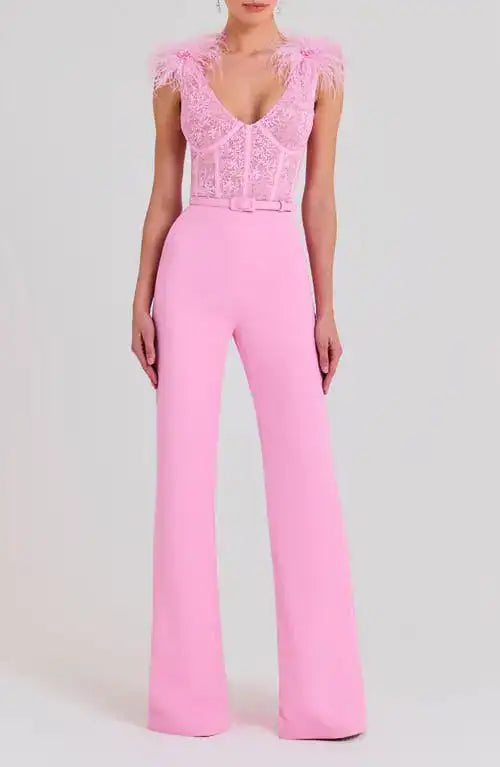 Woman wearing pink Anabelle jumpsuit with sequined bodice and feather shoulders — Nadine Merabi | Endless UAE