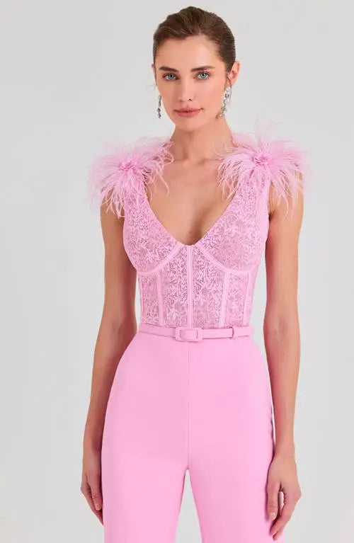 Woman wearing pink Anabelle jumpsuit with sequined bodice and feather shoulders — Nadine Merabi | Endless UAE