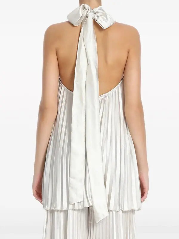 Pleated white halter dress and pants set with black embellished clutch — L'IDÉE | Endless UAE