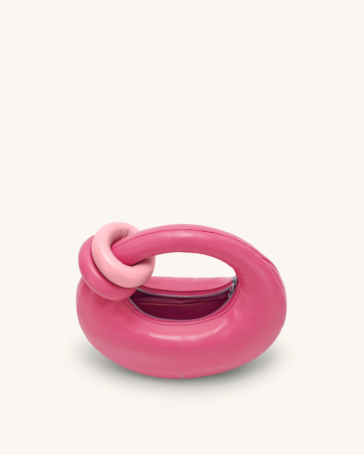 Pink puffy top handle bag with knotted handle and zipper opening, rounded sculptural design — Jw Pei | Endless UAE
