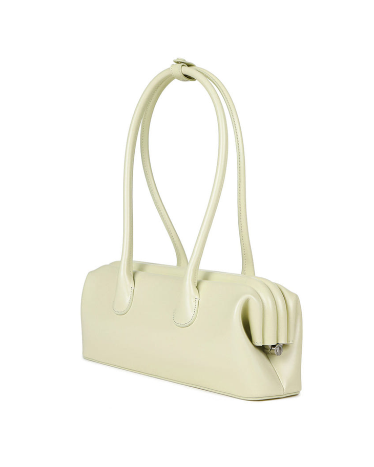 Cream wide boat bag with structured silhouette and silver hardware detail — Osoi | Endless UAE