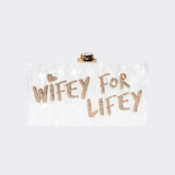 Wifey For Lifey clear clutch bag with gold glitter text and gold-tone hardware — Sophia Webster | Endless UAE