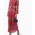 Shimmering pink ombré maxi dress with long sleeves and side cutouts, styled with heels and black clutch — Never Fully Dressed | Endless UAE
