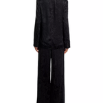 Woman wearing black leopard jacquard blazer and matching wide leg pants with accessories — Farm Rio | Endless UAE
