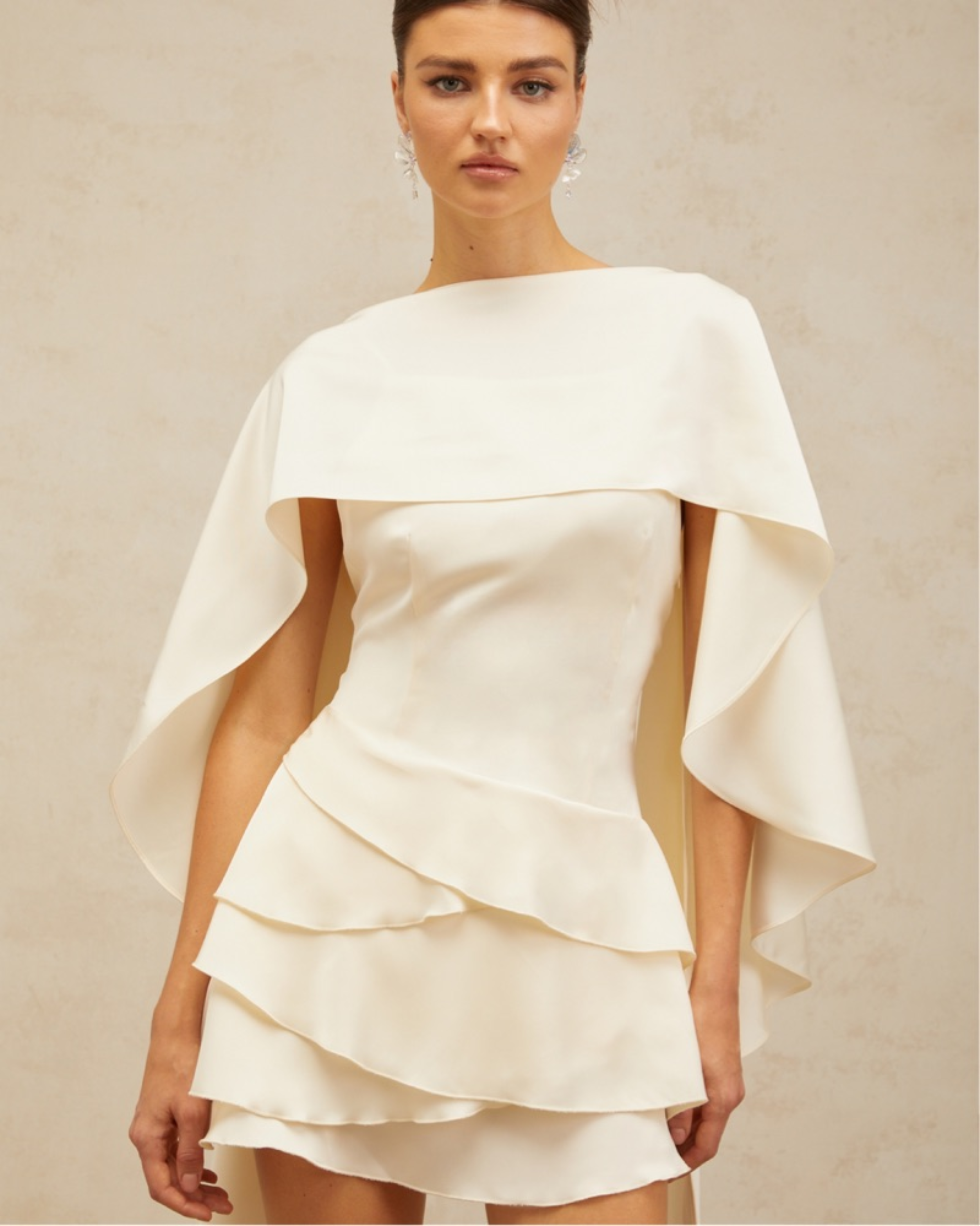 Lyna White Satin Dress with draped cape overlay and tiered skirt — Miss Rosier | Endless UAE