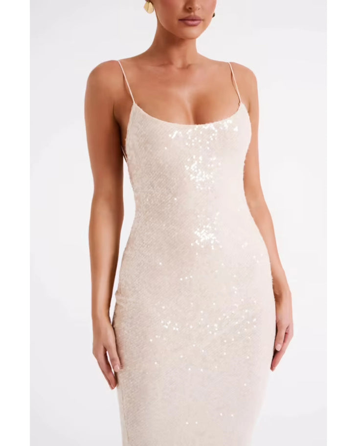 Woman wearing cream sequin maxi dress with thin straps and ankle length — Meshki | Endless UAE