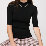Black knit top with pink plaid wool skirt dress — Maje | Endless UAE