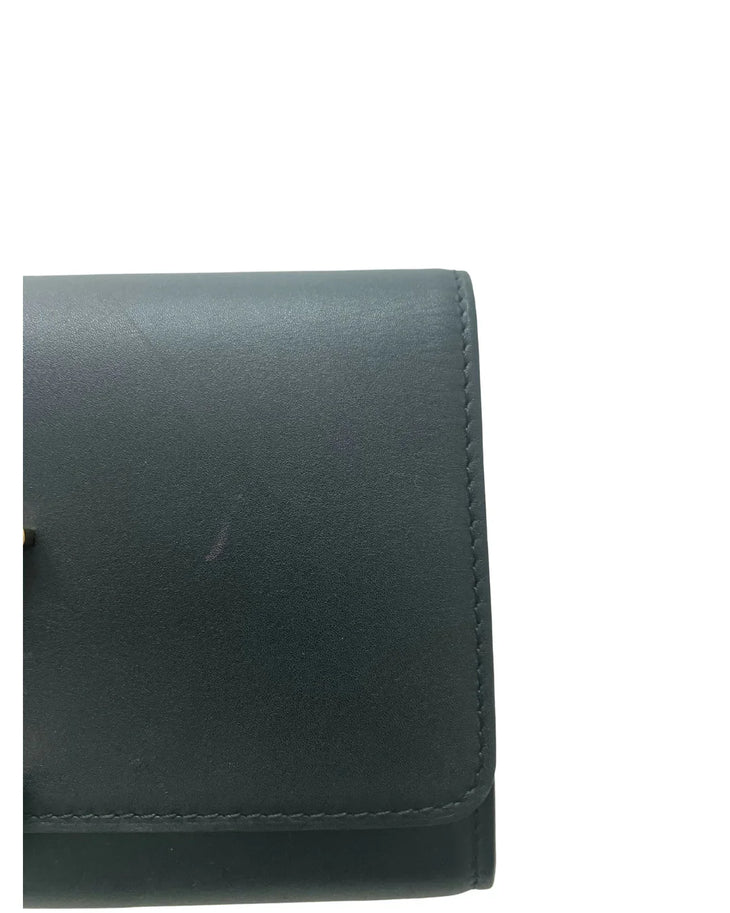 Dark green leather pochette wallet with topstitched edges and folded flap closure — Louis Vuitton | Endless UAE