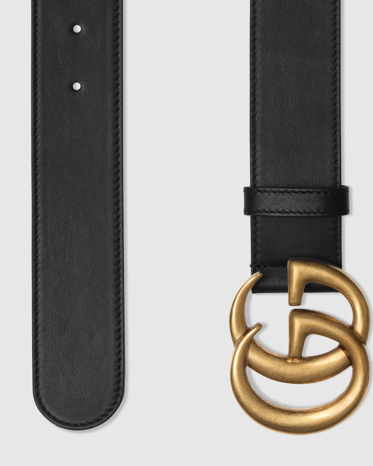 Black leather belt with iconic double G gold-toned buckle, featuring adjustable holes and refined stitching — Gucci | Endless UAE