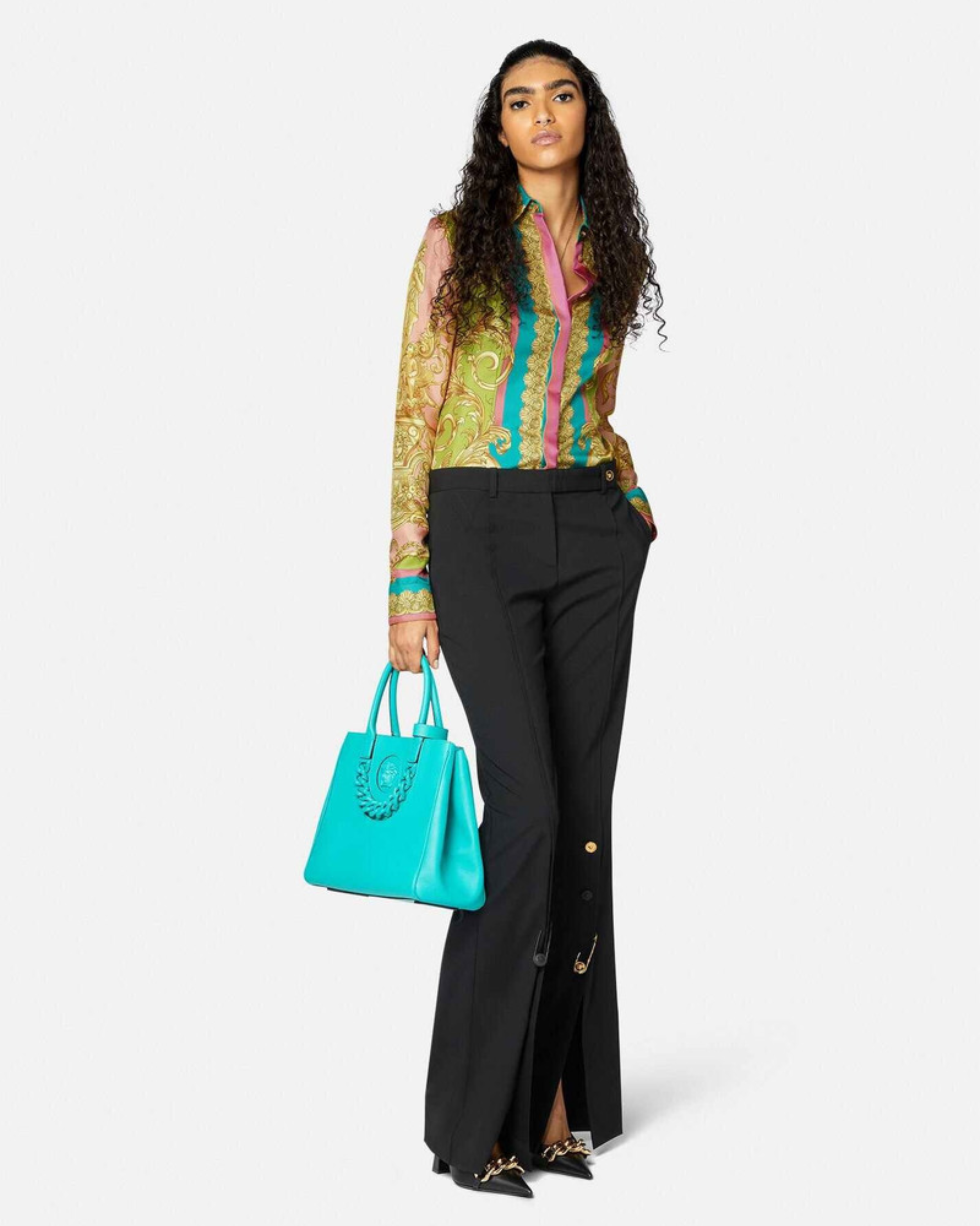 Woman wearing Barocco Goddess silk shirt in yellow with baroque print and colorful placket — Versace | Endless UAE