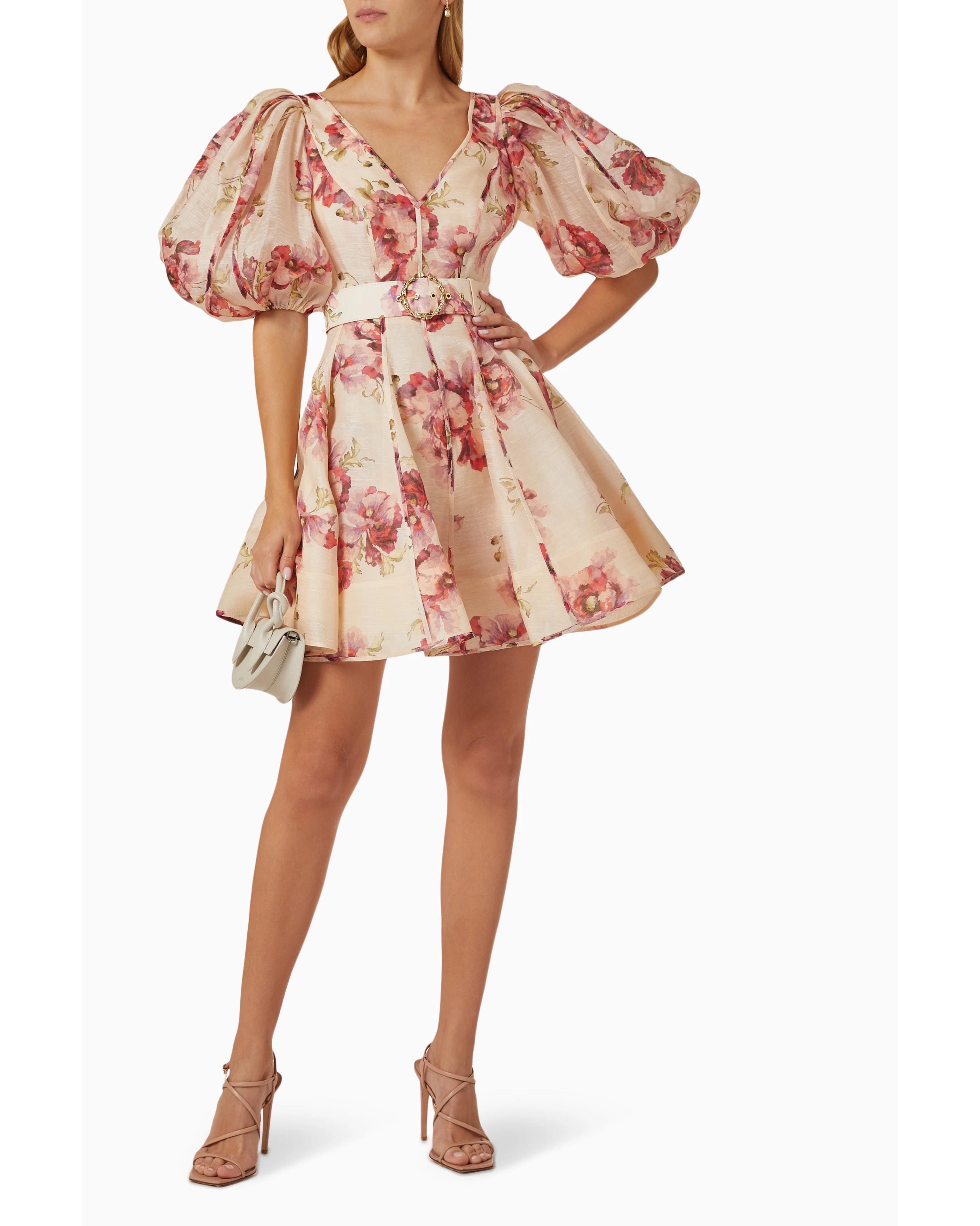 Woman wearing a cream linen mini dress with pink floral print, puff sleeves, and belted waist — ZIMMERMANN | Endless UAE