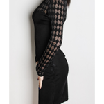 Black lace mini dress with sheer geometric patterned sleeves and solid bodice, side profile view — Balmain | Endless UAE