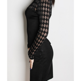 Black lace mini dress with sheer geometric patterned sleeves and solid bodice, side profile view — Balmain | Endless UAE