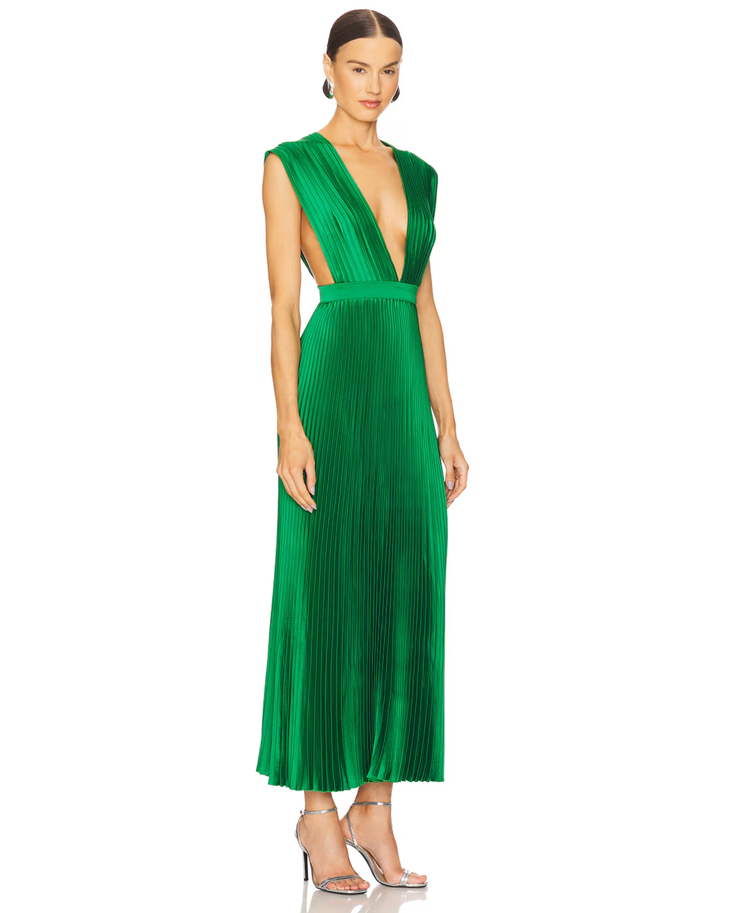 Woman wearing sleeveless green pleated maxi dress with deep V-neckline and cinched waist — L'IDÉE | Endless UAE