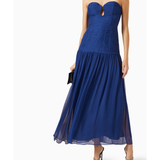 Woman wearing Isola Strapless Ruched Midi Dress in blue with black sandals — Shona Joy | Endless UAE