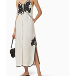 Halayna Embroidered Dress in cream with black floral embroidery and button front — Scarlet Poppies | Endless UAE