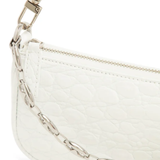 White quilted mini shoulder bag with silver hardware held up against neutral background — By Far | Endless UAE