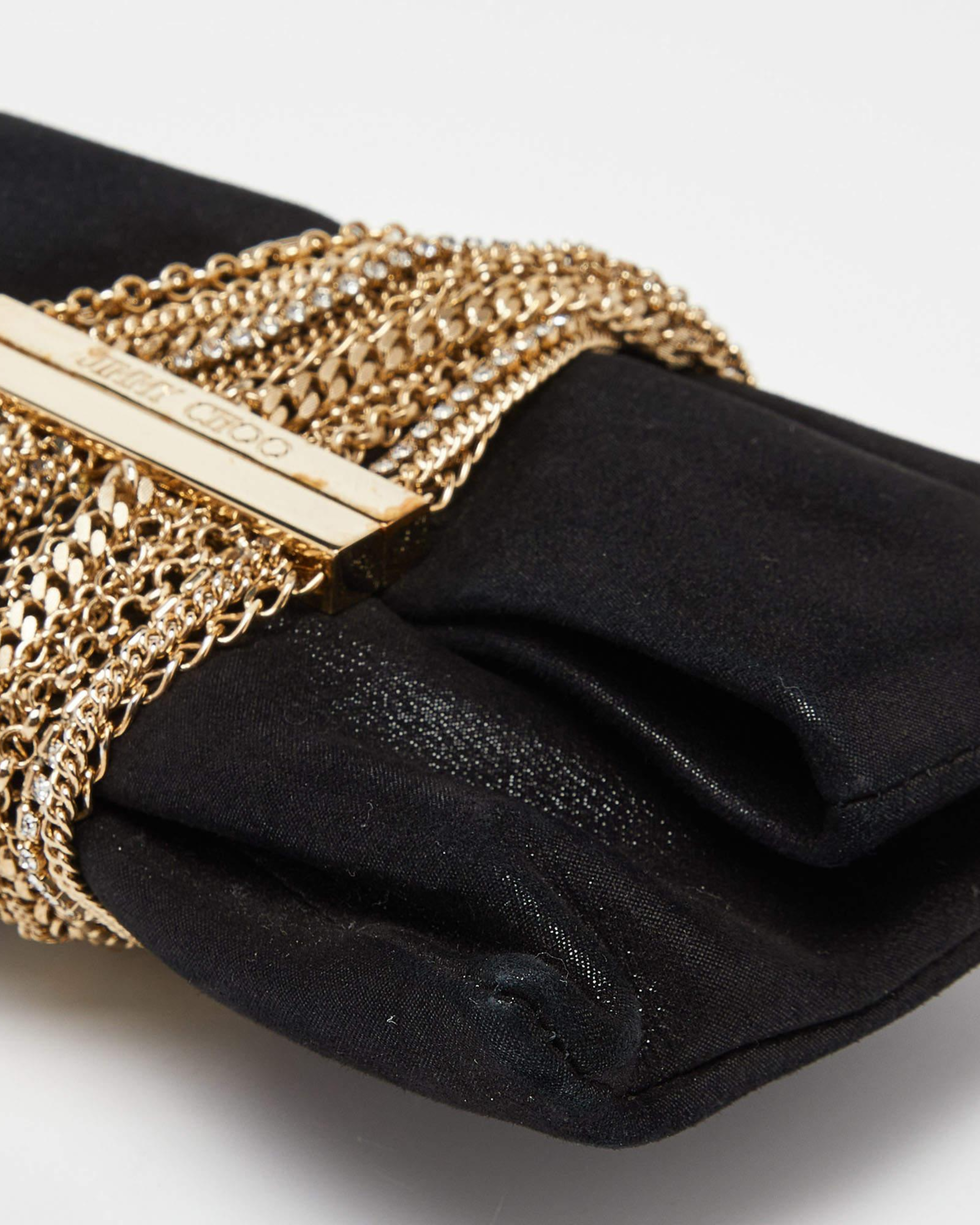 Silver chain tassel clutch with Jimmy Choo logo plate — Jimmy Choo | Endless UAE