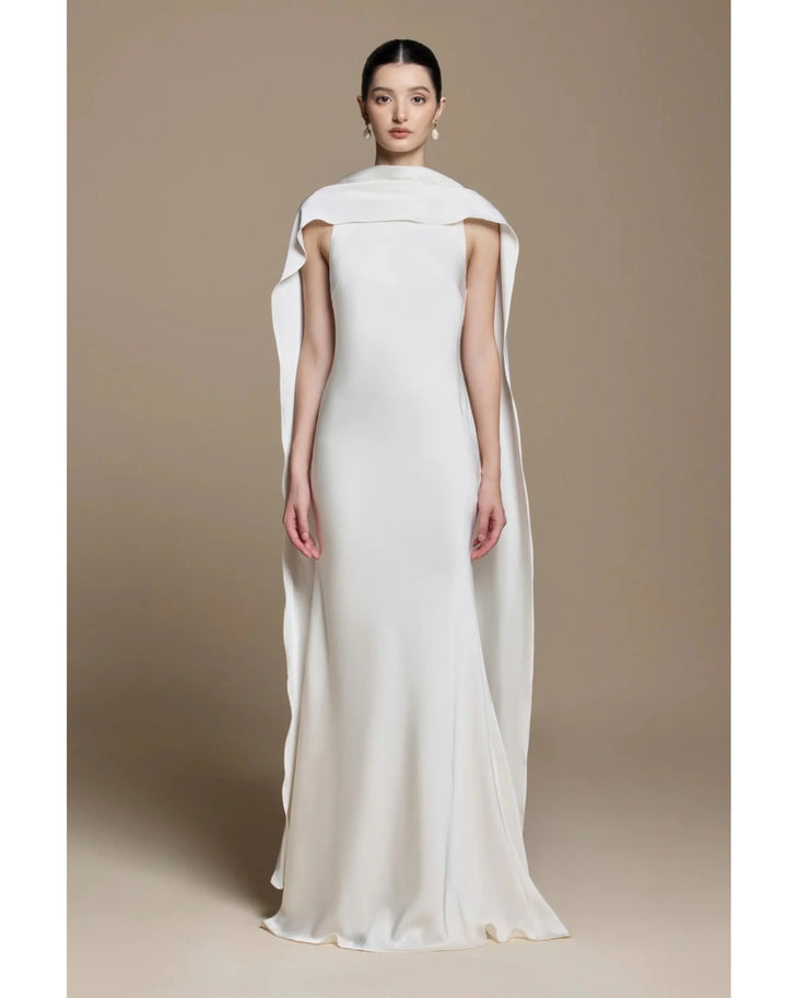 Venus Silk Dress in ivory with dramatic cape detailing, flowing silhouette — Huong Boutique | Endless UAE