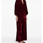Woman wearing burgundy silk velvet jumpsuit with ornamental detailing and wide legs — Themis-Z | Endless UAE