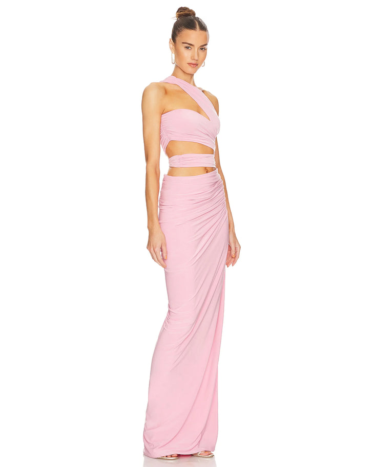 Woman wearing pink Cassia Dress with asymmetrical neckline, cutout details, and high slit — J.Angelique | Endless UAE