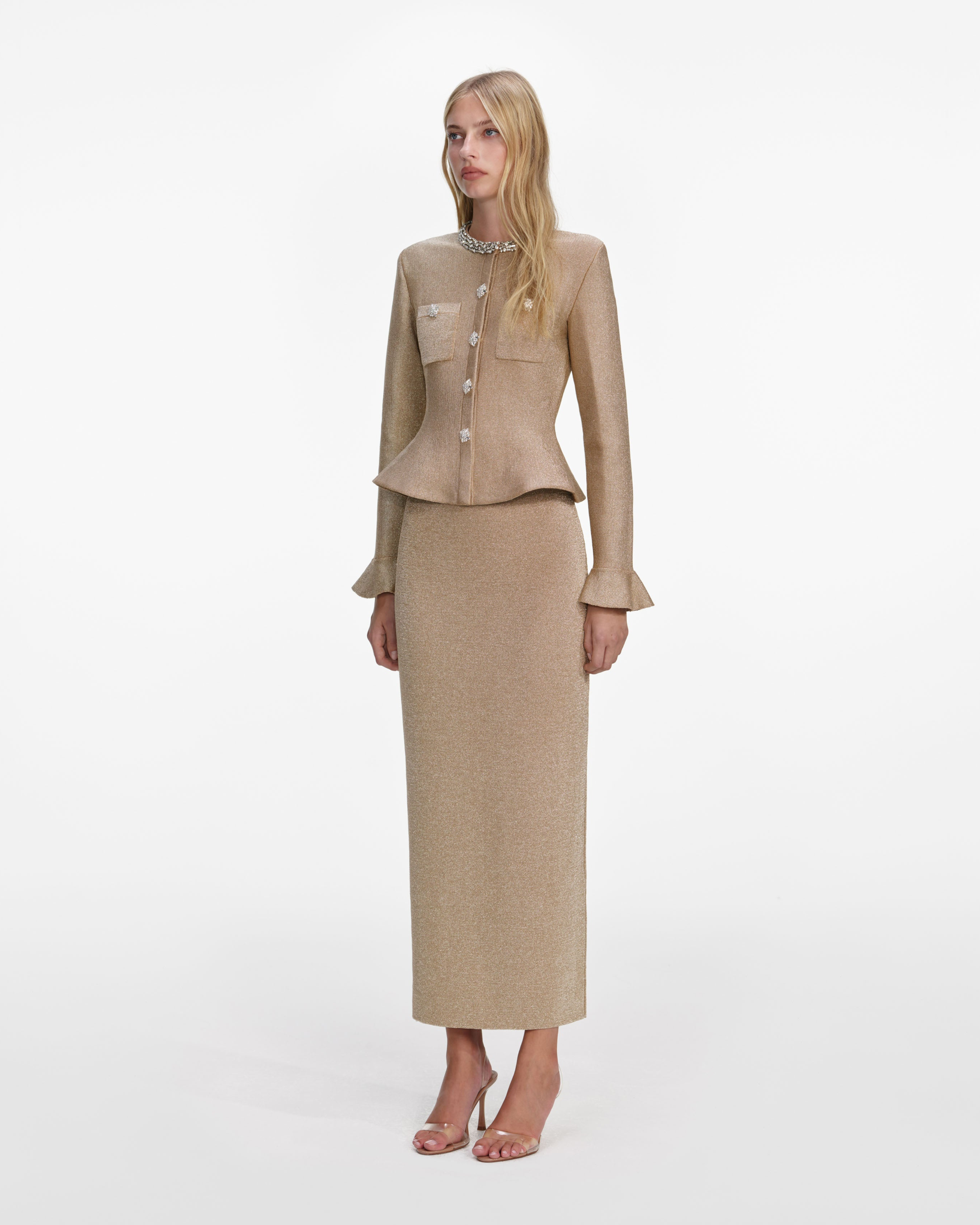 Woman wearing a beige knit midi dress with crystal trim detailing and matching cropped jacket — Self-Portrait | Endless UAE