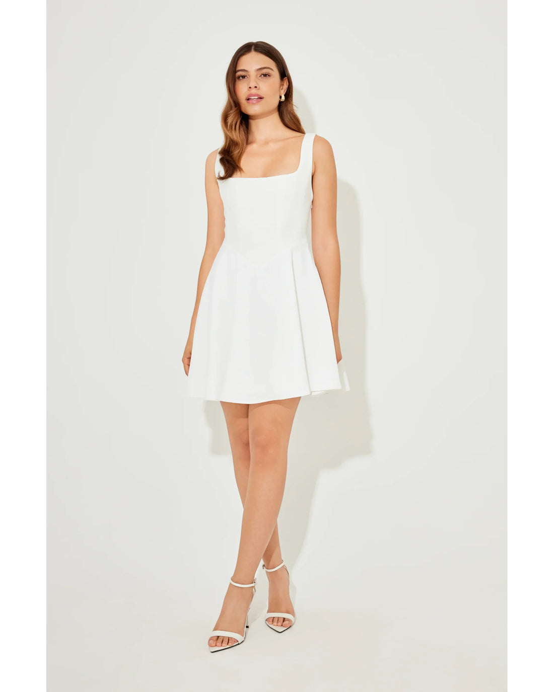 Woman wearing white sleeveless square neck mini dress with white heeled sandals — Odd Muse | Endless UAE