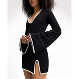 Black V-neck mini dress with pearl trim and bell sleeves — Khanum's | Endless UAE