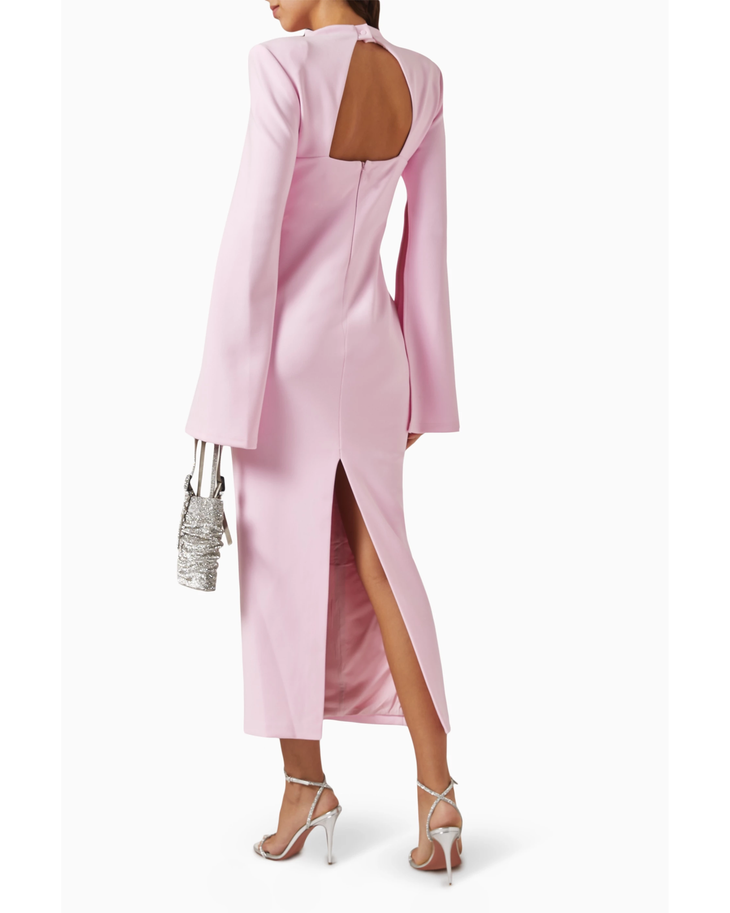 Pink satin midi dress with open back cutout, long sleeves, high slit and silver strappy heels — Mossman | Endless UAE