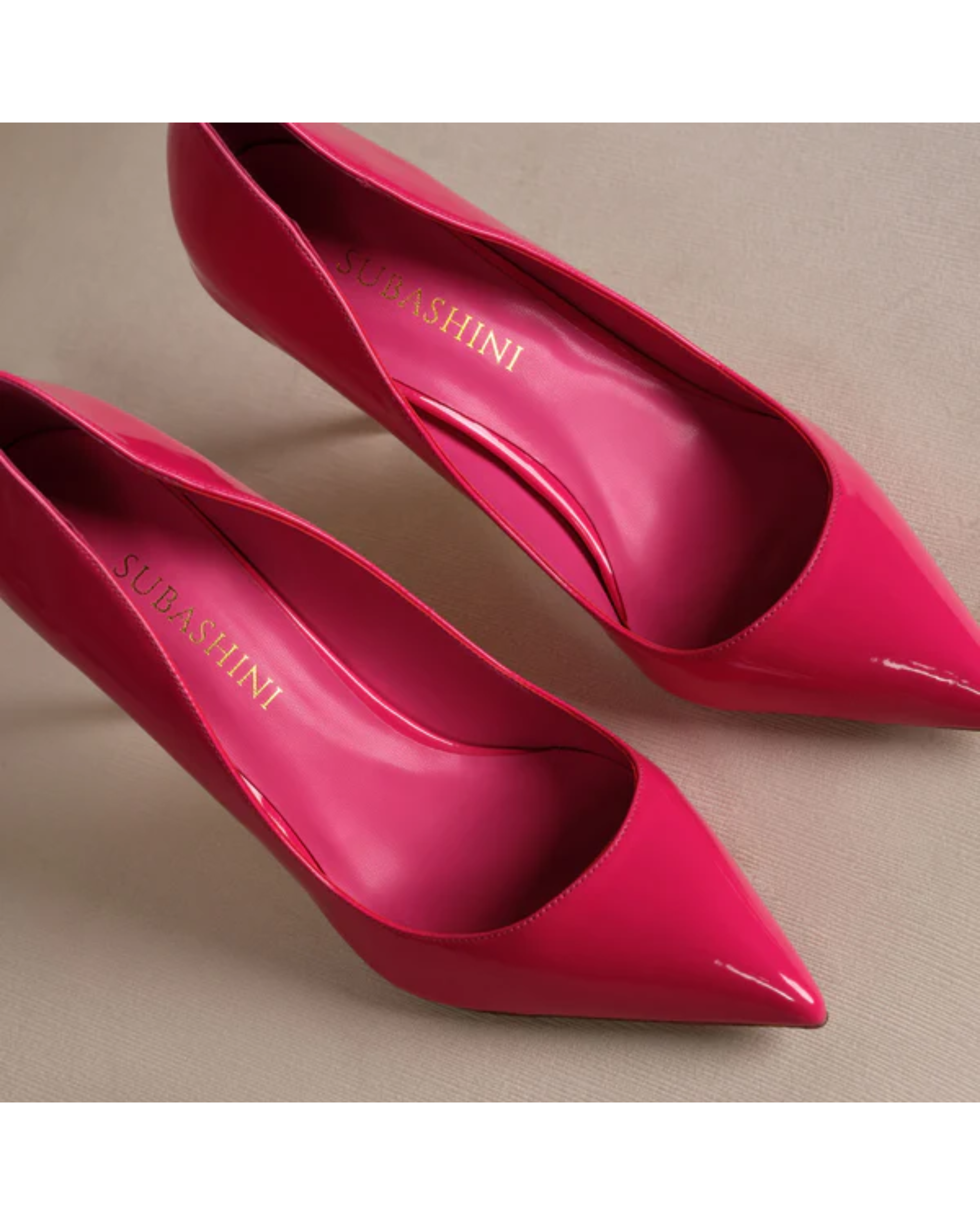 Hot pink patent leather pointed-toe pumps with branded insole — Subashini Heels | Endless UAE