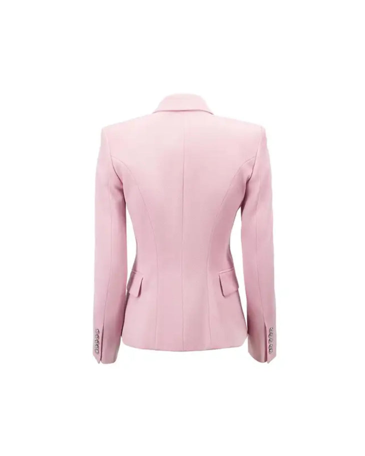 Woman wearing pink double-breasted Balmain blazer with matching skirt and black heels — Balmain | Endless UAE