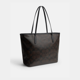 Black leather tote bag with dual handles and Coach branding — Coach | Endless UAE