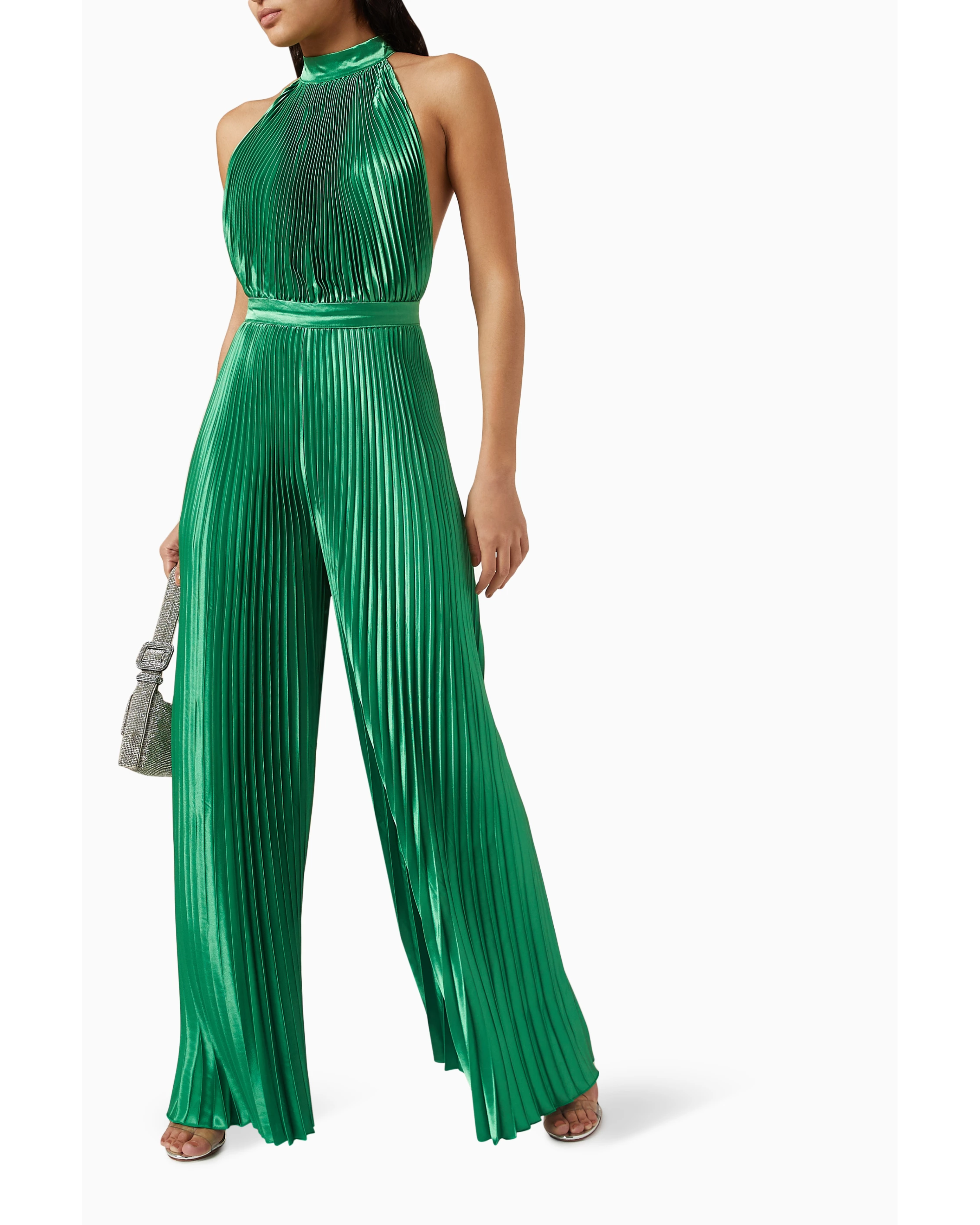 Green pleated halter jumpsuit with low back design — L'IDÉE | Endless UAE