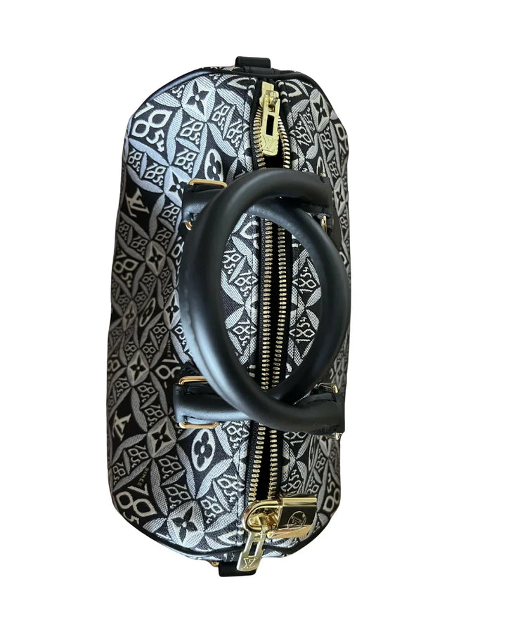 Louis Vuitton Since 1854 Speedy Bandouliere 25 bag in monogram jacquard with leather handles and gold hardware — Louis Vuitton | Endless UAE